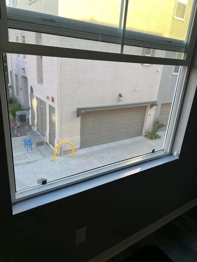 Window with a screen, seen from inside a home
